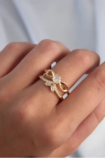 Pirinç Ayarlamalı Gold Renk Zirkon Taşlı 2li Görünüm Fiyonk Yüzük Pirinç Ayarlamalı Gold Renk Zirkon Taşlı 2li Görünüm Fiyonk Yüzük