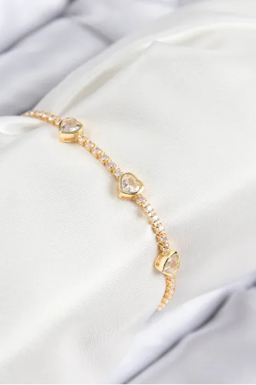 Pirinç Zirkon Taşlı Sıralı Kalp Model Gold Renk Kadın Bileklik Pirinç Zirkon Taşlı Sıralı Kalp Model Gold Renk Kadın Bileklik