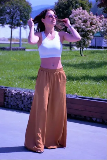 Kadın Taba Beli Lastikli Cepli Bol Paça Salaş Oversize Kahverengi Yumuşak Dokulu Pantolon 3391200 Kadın Taba Beli Lastikli Cepli Bol Paça Salaş Oversize Kahverengi Yumuşak Dokulu Pantolon 3391200