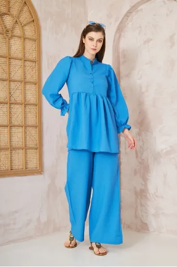 Kadın Mavi Gofre Balon Kol Büzgülü Tunik / Beli Lastikli Cepli Pantolon Tesettür Takım 700-3531396 Kadın Mavi Gofre Balon Kol Büzgülü Tunik / Beli Lastikli Cepli Pantolon Tesettür Takım 700-3531396