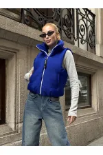 Saks Mavi Sırtı Taş İşlemeli Dik Yaka Kısa Şişme Yelek Saks Mavi Sırtı Taş İşlemeli Dik Yaka Kısa Şişme Yelek