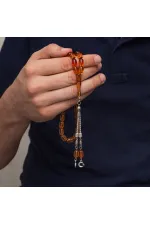 Metal Püsküllü Şeffaf Turuncu Sıkma Kehribar Tesbih Metal Püsküllü Şeffaf Turuncu Sıkma Kehribar Tesbih