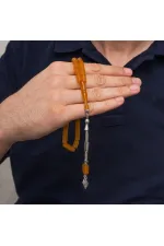 Metal Püsküllü 7x11 mm Kesme Sıkma Kehribar Tesbih
