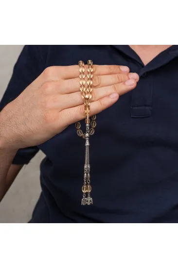 Metal Püsküllü Şeffaf Sıkma Kehribar Tesbih Metal Püsküllü Şeffaf Sıkma Kehribar Tesbih
