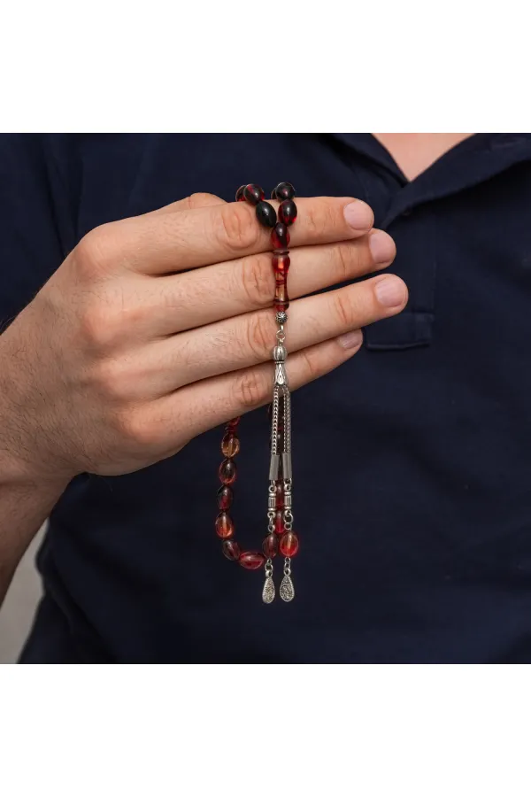 Metal Püsküllü Siyah ve Ateş Tonlu Sıkma Kehribar Tesbih Metal Püsküllü Siyah ve Ateş Tonlu Sıkma Kehribar Tesbih